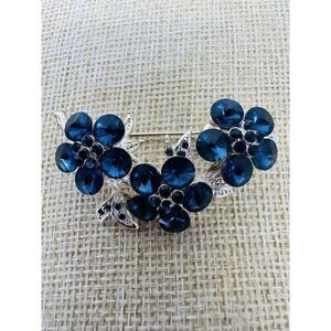Silver Tone Brooch With Three Brilliant Blue Rhinestone 5‎ Petal Flowers 2"